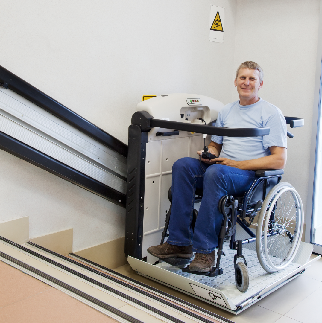 disability access man on stair lift
