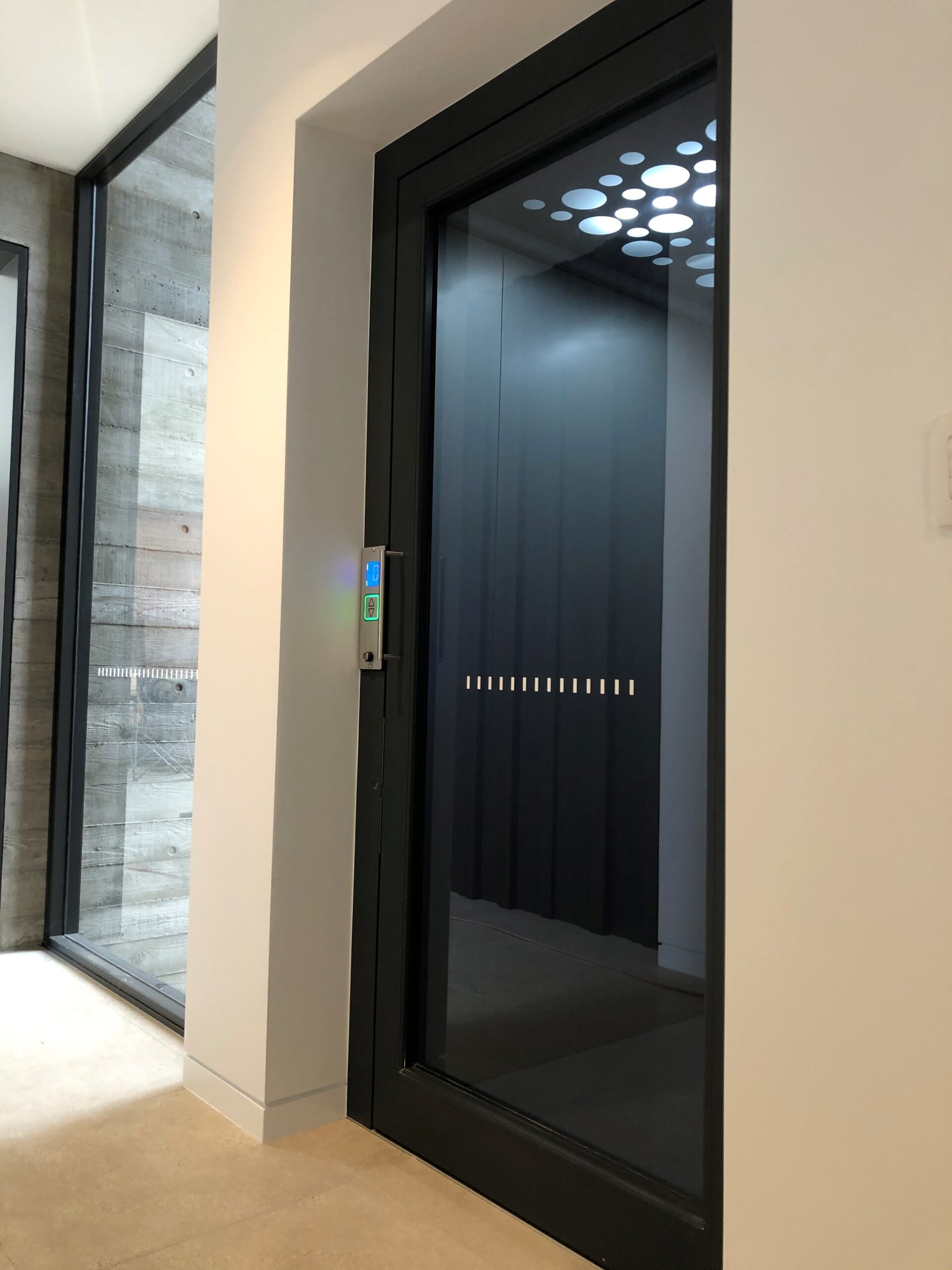 An elevator door inside a house