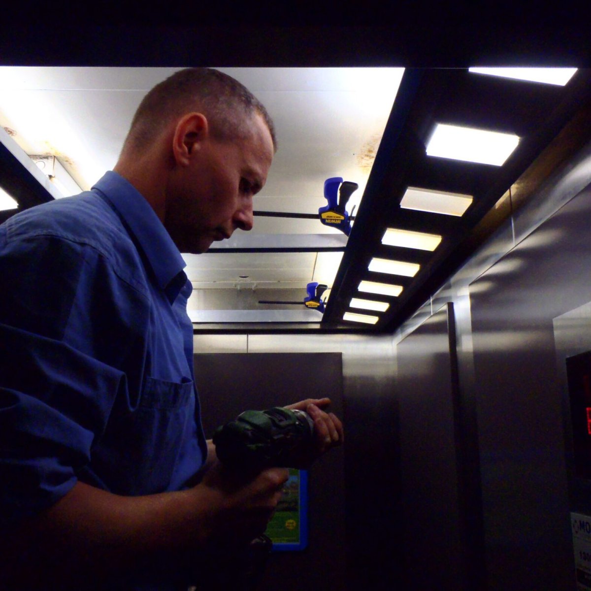 A Simplex Elevator technician at work Maintenance | Simplex Elevators Gallery Image 9